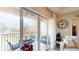 Private balcony overlooking the water with outdoor seating at 3322 Purple Martin Dr # 126, Punta Gorda, FL 33950
