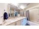 Double vanity bathroom with granite countertops at 3322 Purple Martin Dr # 126, Punta Gorda, FL 33950