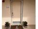 Condo entrance with a welcoming mat and potted plants at 3322 Purple Martin Dr # 126, Punta Gorda, FL 33950