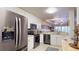 Open concept kitchen featuring stainless steel appliances and granite counters at 3322 Purple Martin Dr # 126, Punta Gorda, FL 33950