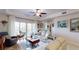 Comfortable living room with stylish decor and balcony access at 3322 Purple Martin Dr # 126, Punta Gorda, FL 33950