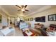 Spacious living room, featuring ample seating and a large TV at 3322 Purple Martin Dr # 126, Punta Gorda, FL 33950