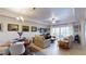 Spacious living area with light beige sofas and water views at 3322 Purple Martin Dr # 126, Punta Gorda, FL 33950
