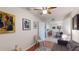 Cozy living room features a comfy chair and view into the dining area at 3322 Purple Martin Dr # 126, Punta Gorda, FL 33950