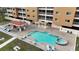 Community pool and spa with covered patio area at 3322 Purple Martin Dr # 126, Punta Gorda, FL 33950