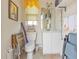 Small bathroom with toilet, vanity, and shelving at 3411 Curacao Ct, Punta Gorda, FL 33950