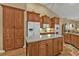 Well-equipped kitchen with ample cabinetry and an island breakfast bar at 3411 Curacao Ct, Punta Gorda, FL 33950