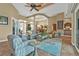 Open and airy living area with neutral tones and lots of natural light at 3411 Curacao Ct, Punta Gorda, FL 33950