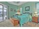 Spacious main bedroom with water views and en-suite bath at 3411 Curacao Ct, Punta Gorda, FL 33950
