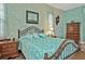 Main bedroom with a calming color palette and ample space at 3411 Curacao Ct, Punta Gorda, FL 33950