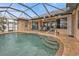 Relaxing pool area with screened enclosure at 3411 Curacao Ct, Punta Gorda, FL 33950