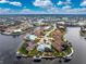 Expansive aerial view showcasing the home's waterfront setting and community at 3412 Nighthawk Ct, Punta Gorda, FL 33950