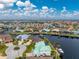 Bird's-eye view of a waterfront home in a tranquil community setting at 3412 Nighthawk Ct, Punta Gorda, FL 33950