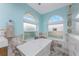 Spa-like bathroom featuring a freestanding tub and large windows at 3412 Nighthawk Ct, Punta Gorda, FL 33950