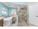 Elegant bathroom with soaking tub, walk-in shower, and stylish tile at 3412 Nighthawk Ct, Punta Gorda, FL 33950