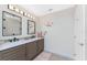Modern bathroom with double vanity and stylish decor at 3412 Nighthawk Ct, Punta Gorda, FL 33950