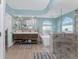 Spa-like bathroom with double vanity and large soaking tub at 3412 Nighthawk Ct, Punta Gorda, FL 33950