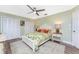 Peaceful bedroom with a comfortable bed and updated flooring at 3412 Nighthawk Ct, Punta Gorda, FL 33950