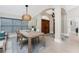 Open concept dining room with view to entryway at 3412 Nighthawk Ct, Punta Gorda, FL 33950