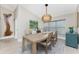 Spacious dining area with wood table and neutral decor at 3412 Nighthawk Ct, Punta Gorda, FL 33950