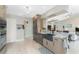 Modern kitchen with stainless steel appliances and a farmhouse sink at 3412 Nighthawk Ct, Punta Gorda, FL 33950