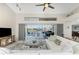 Living area with sectional sofa and view of pool at 3412 Nighthawk Ct, Punta Gorda, FL 33950