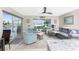 Comfortable living room with sectional sofa and waterfront views at 3412 Nighthawk Ct, Punta Gorda, FL 33950