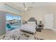 Main bedroom with water views and a comfortable king bed at 3412 Nighthawk Ct, Punta Gorda, FL 33950