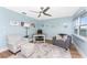 Serene home office boasts water views and comfortable seating at 3412 Nighthawk Ct, Punta Gorda, FL 33950