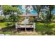 Enjoy lake views from the backyard's deck, which includes comfortable seating at 4267 Adelaide Ave, North Port, FL 34288