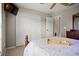 Comfortable bedroom featuring neutral colors, a ceiling fan, and a large closet at 4267 Adelaide Ave, North Port, FL 34288