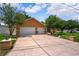 Spacious home with a large driveway and attached two-car garage at 4267 Adelaide Ave, North Port, FL 34288