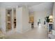 Bright, open-concept living space with tile flooring and neutral wall colors at 4267 Adelaide Ave, North Port, FL 34288