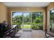 Enjoy beautiful views from the covered lanai overlooking the well-manicured backyard and scenic lake at 4267 Adelaide Ave, North Port, FL 34288