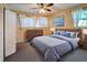 Spacious bedroom featuring a dresser and a comfortable bed at 514 Orlando Blvd, Port Charlotte, FL 33954