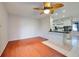 Open dining area with kitchen views and wood flooring at 514 Orlando Blvd, Port Charlotte, FL 33954