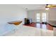Bright dining area with wood flooring and access to a sliding glass door at 514 Orlando Blvd, Port Charlotte, FL 33954