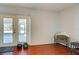 Gathering room with sliding glass doors leading to screened patio at 514 Orlando Blvd, Port Charlotte, FL 33954