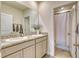 Double vanity bathroom with granite countertops at 5274 Grove Mill Loop, Bradenton, FL 34211