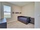 Small bedroom with twin bed and baseball hats at 5274 Grove Mill Loop, Bradenton, FL 34211