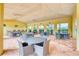Relaxing community patio with shaded seating areas and tables at 5274 Grove Mill Loop, Bradenton, FL 34211