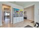 Home gym area with built-in shelving and exercise mat at 5274 Grove Mill Loop, Bradenton, FL 34211