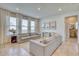 Living area with two sofas and neutral decor at 5274 Grove Mill Loop, Bradenton, FL 34211