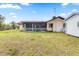 Large backyard with screened patio and shed at 716 Mirado Nw Ln, Port Charlotte, FL 33948