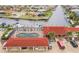 Aerial view showing community pool, parking and waterfront location at 1 Colony Point Dr # A19, Punta Gorda, FL 33950