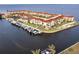 Waterfront property with boat docks and a large building at 1 Colony Point Dr # A19, Punta Gorda, FL 33950