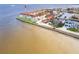 Aerial of waterfront condos with beach access, boat slips, and neighborhood parking at 1 Colony Point Dr # A19, Punta Gorda, FL 33950