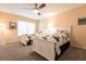 Guest bedroom with two twin beds, ceiling fan and ample closet space at 1 Colony Point Dr # A19, Punta Gorda, FL 33950