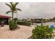 Relaxing canal-front patio with lush landscaping and seating at 1 Colony Point Dr # A19, Punta Gorda, FL 33950