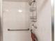 Accessible shower with grab bars and a built-in shower caddy at 1 Colony Point Dr # A19, Punta Gorda, FL 33950